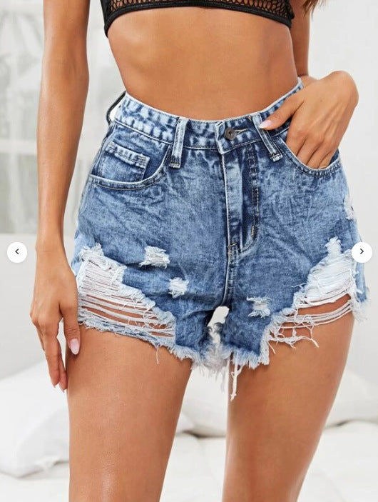 Dame Ripped Denim-Shorts med høj talje og fashionable distressed-look Stilla