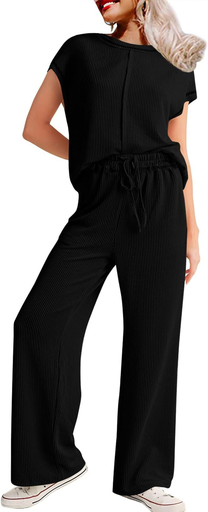 Dame Komfortabel og moderigtigt jumpsuit med brede ben og elastisk talje Stiila