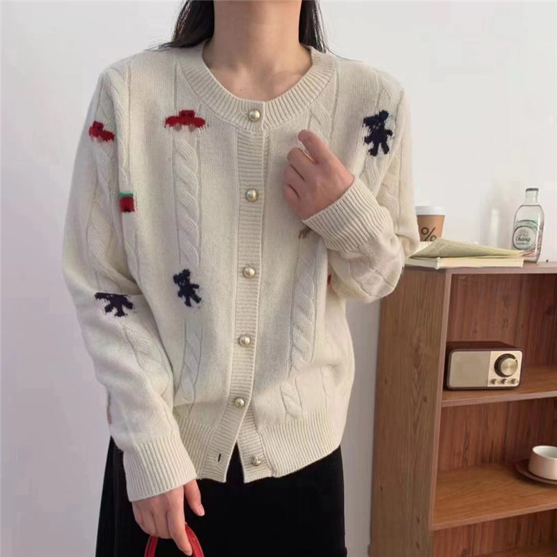 Kvinders cardigan med farverigt motiv og dekorative knapper Stilla