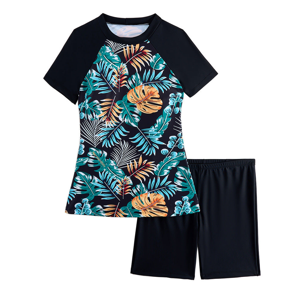 Dame Rashguard-sæt med moderne blomsterdesign og sporty pasform Stilla