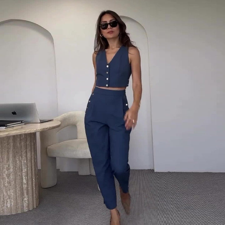Dame crop-top med elegante knapper og højtaljede bukser Stilla