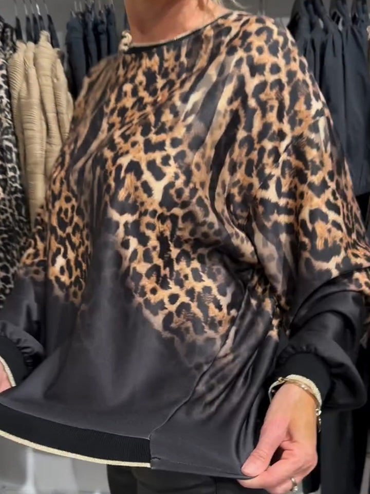 Dame top med dyreprint og elegant snit Stilla