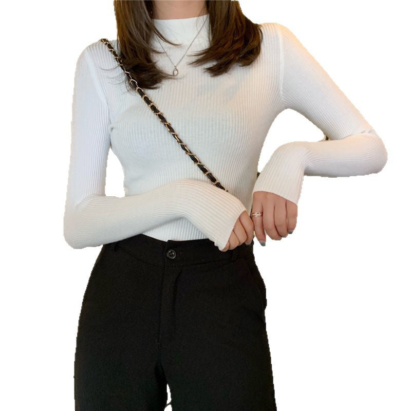 Dame mode højhalset sweater i ribstrik design Stilla