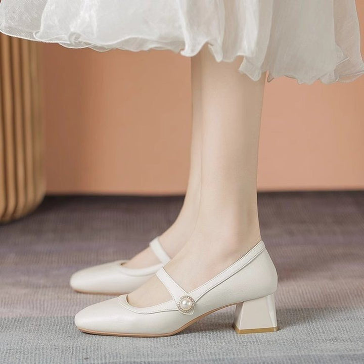 Dame ballerinas med elegant remdesign og fashionabel perledekor Stilla