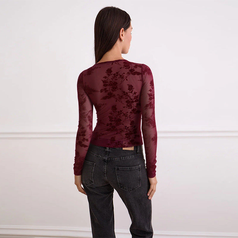 Dame spids top med dyb V-hals og blomsterdesign Skovae