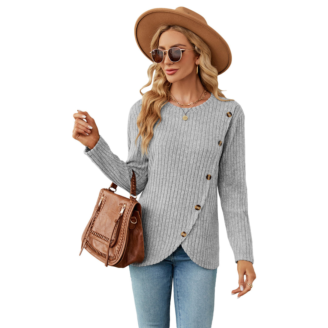 Dame strikpullover med asymmetrisk knapdesign og ribstruktur Stilla