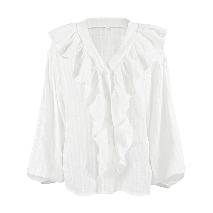 Damebluse med voluminøse flæsedetaljer og elegant V-udskæring Stilla