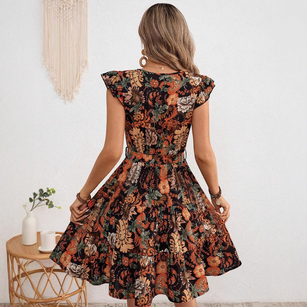 Dame wrap dress med voluminøse flæsedetaljer og blomster mønster Stilla