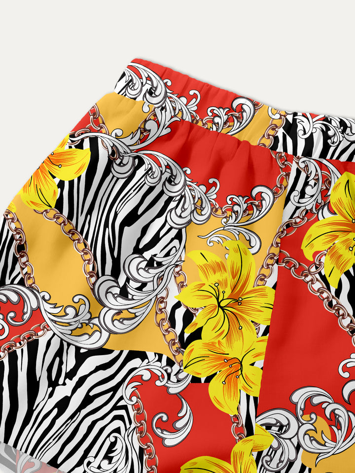 Dame mode bandeau-top og shorts-sæt med farverigt grafikdesign Stilla