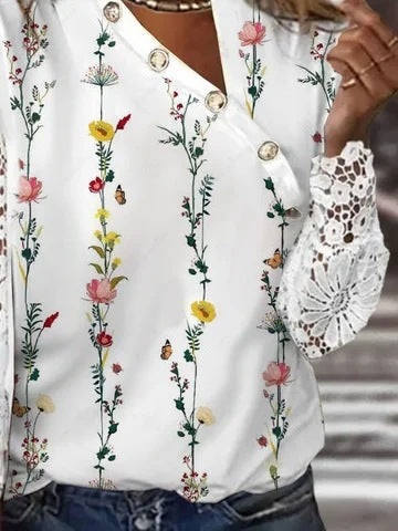 Dame elegant bluse med spidsærmer og knapdetaljer Stilla