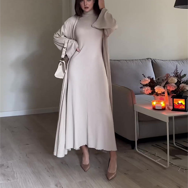 Dame elegant maxikjole med høj krave og bredt skårne ærmer Stilla