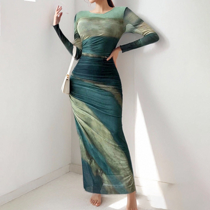 Dame maxikjole med raffinerede draperingsdetaljer og elegant farveforløb Stilla