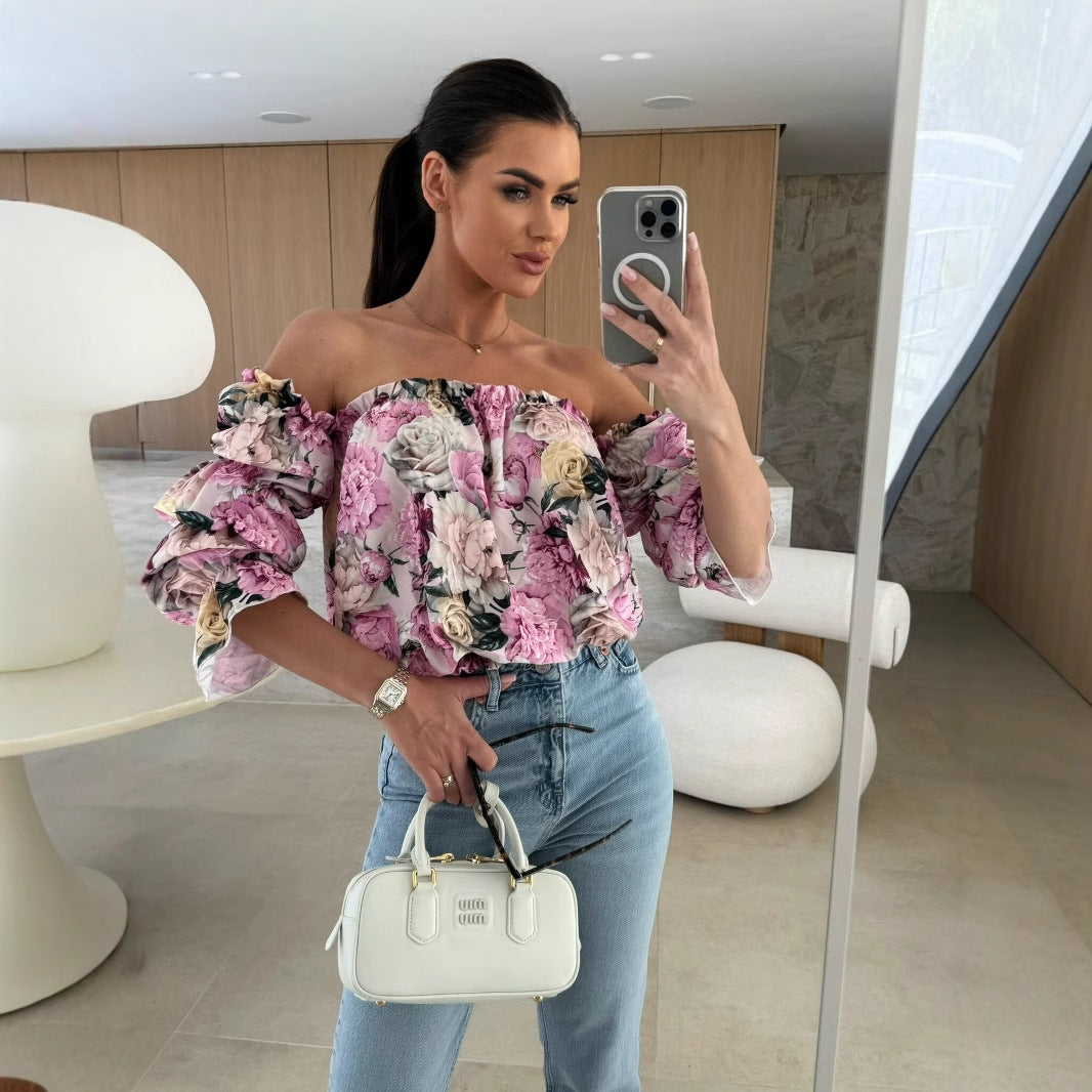 Dame Off-Shoulder-bluse med volumniøse ærmer og blomsterdesign Stilla