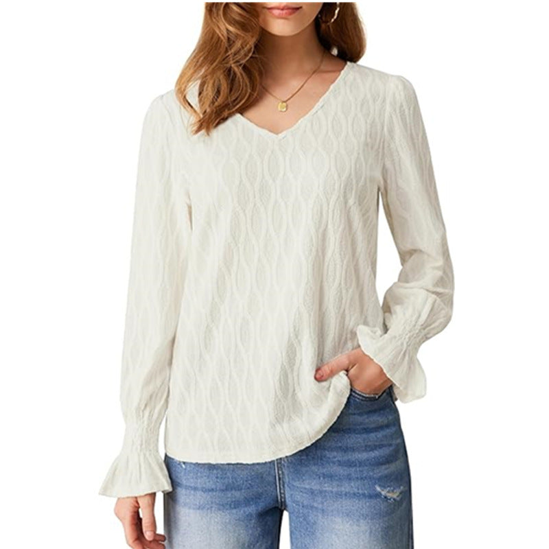 Dame V-hals bluse med unikt strukturdesign Stilla