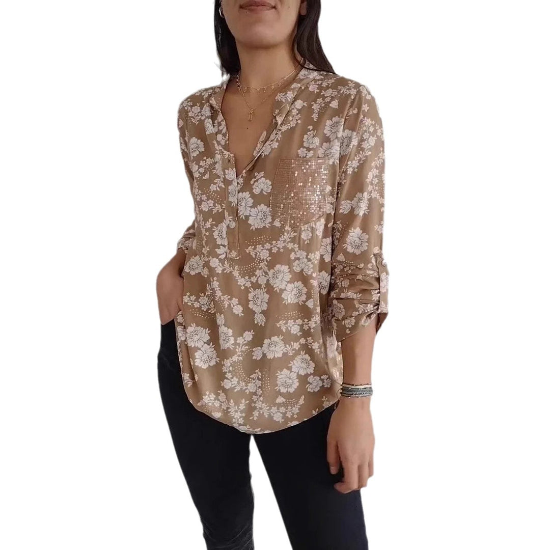 Damebluse med blomsterdesign og glitrende pailletter Stilla