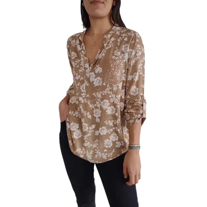 Damebluse med blomsterdesign og glitrende pailletter Stilla
