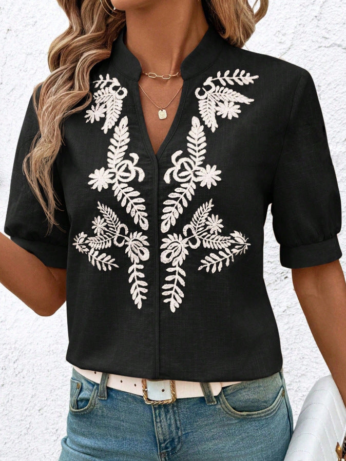 Dame elegant kortærmet bluse med blomstret broderimønster Stilla