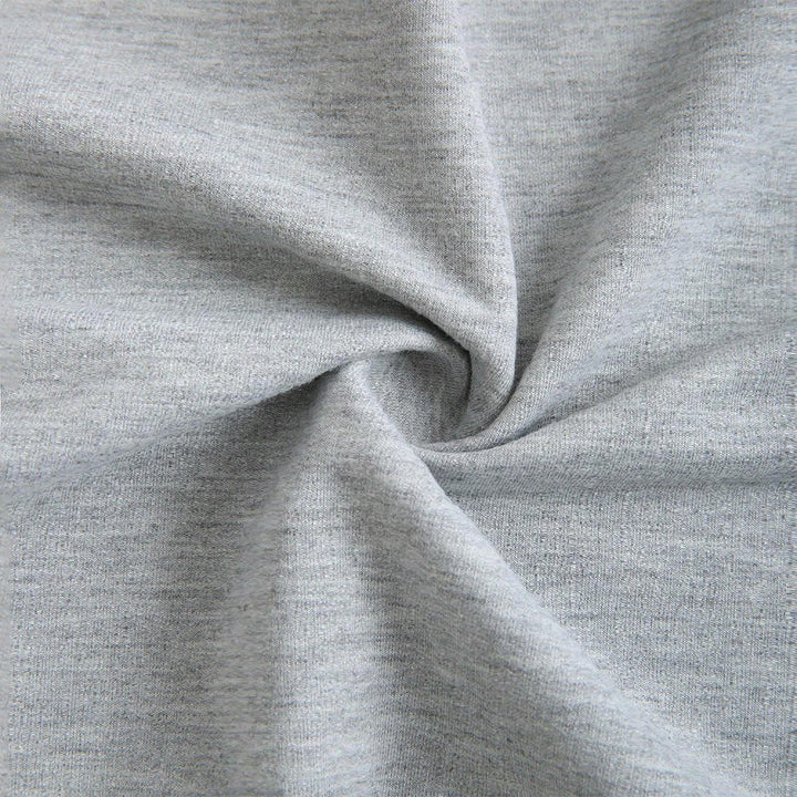 Kvindernes cropped sweatshirt med asymmetrisk design og voluminøse ærmer Stilla