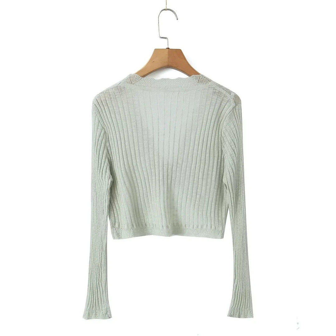 Dame cropped strikjakke med fint ribdesign og sarte spidsdetaljer Stilla