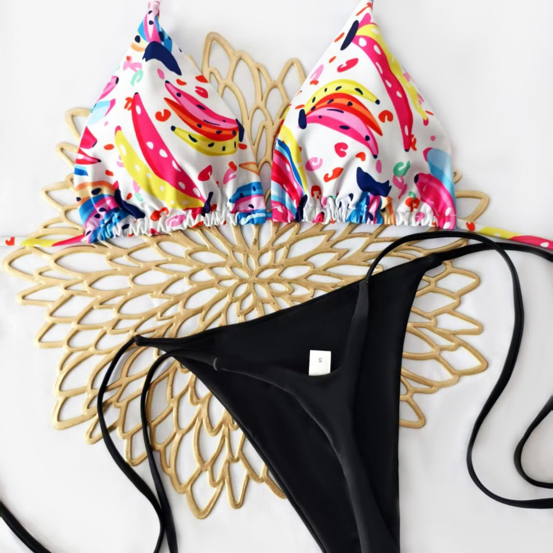 Dame bikini-sæt med farverigt frugtmønster og sidelæns knude Skovae