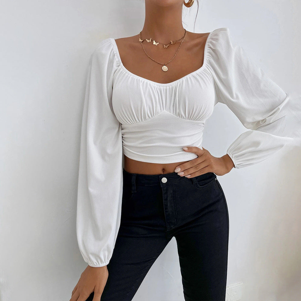 Kvindernes cropped top med stilfuld puffærmedesign og figursyet pasform Stilla