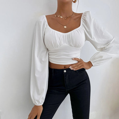Kvindernes cropped top med stilfuld puffærmedesign og figursyet pasform Stilla