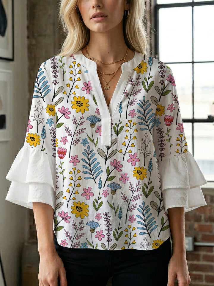 Damebluse med voluminøse flæseærmer og blomstermønster Skovae