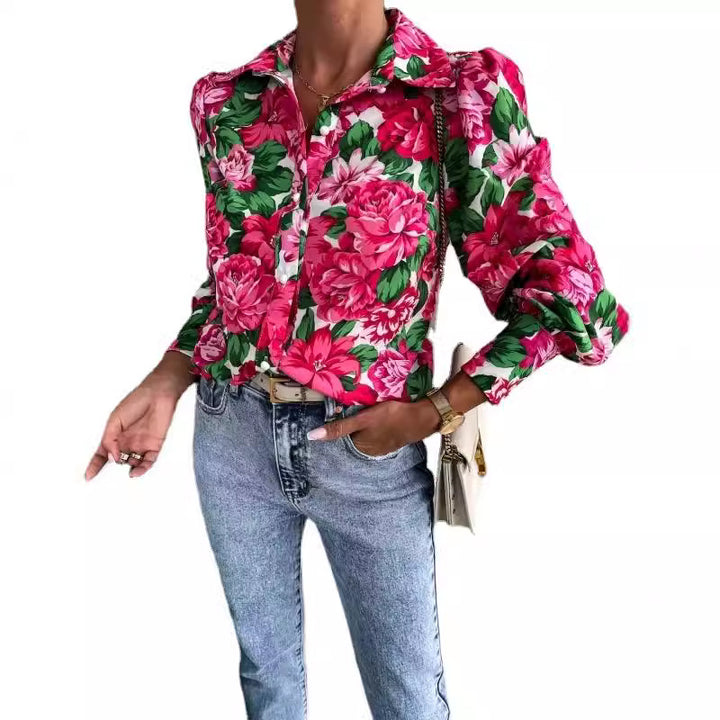 Damebluse med blomstret design og voluminøse ærmer Stilla