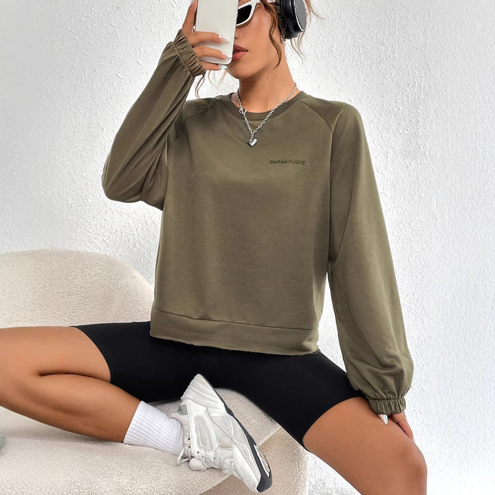 Kvinders afslappede raglan sweatshirts med elastiske manchetter og minimalistisk design Stilla