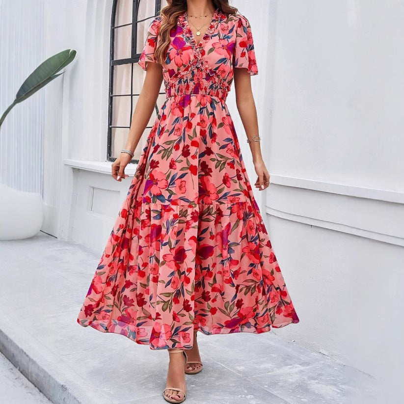 Dame maxikjole med blomsterprints og svungent snit Stilla