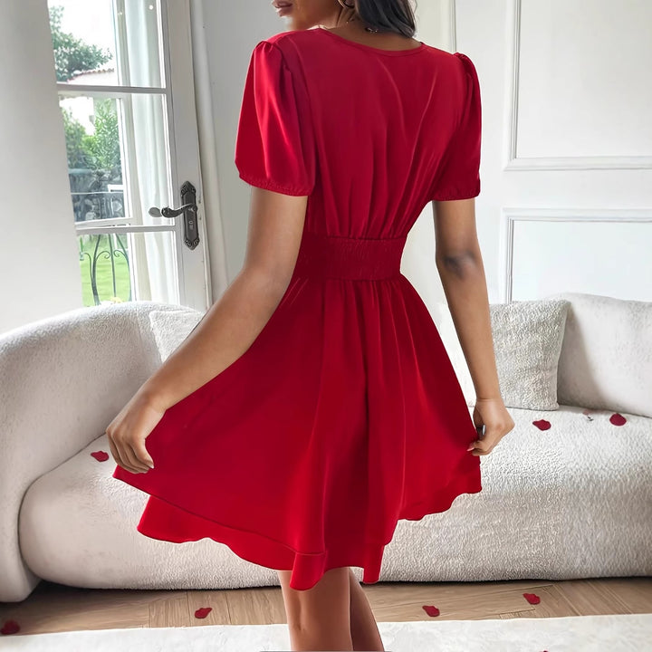 Dame omslagkjole med voluminøst skirt og puffærmer Stilla
