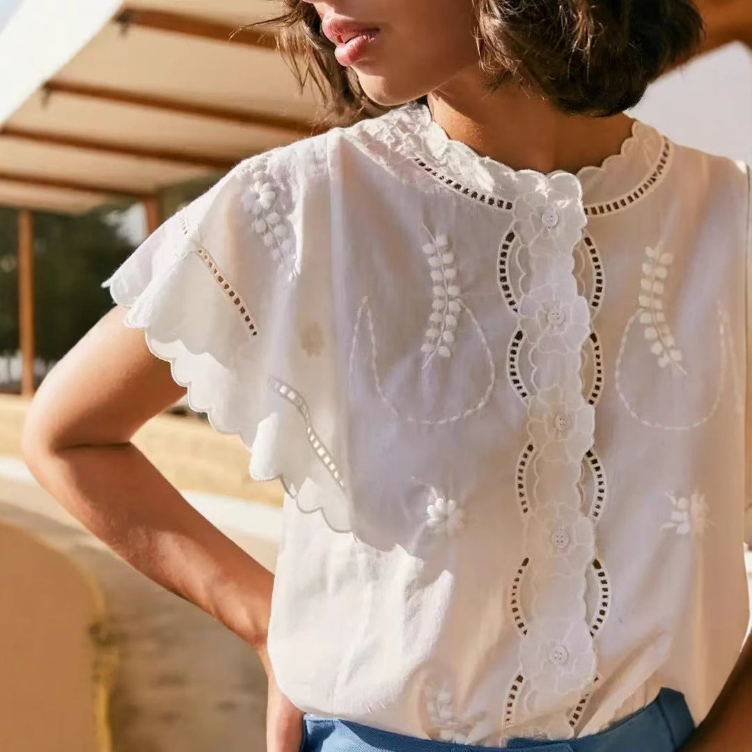 Dame bluse med elegante spidse accenter og voluminøse ærmer Stilla