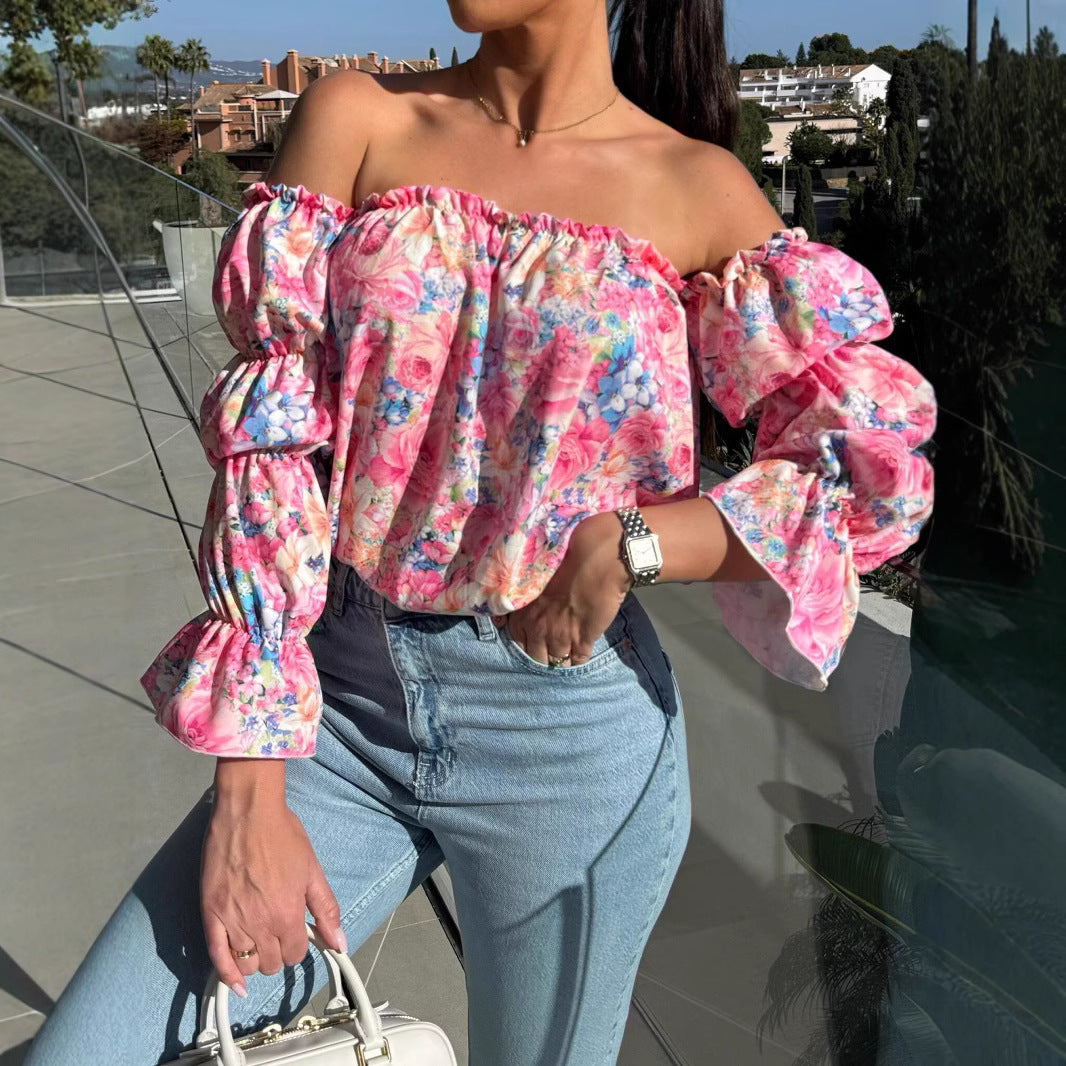 Dame Off-Shoulder Bluse med voluminøse rufflesærmer og floral design Stilla