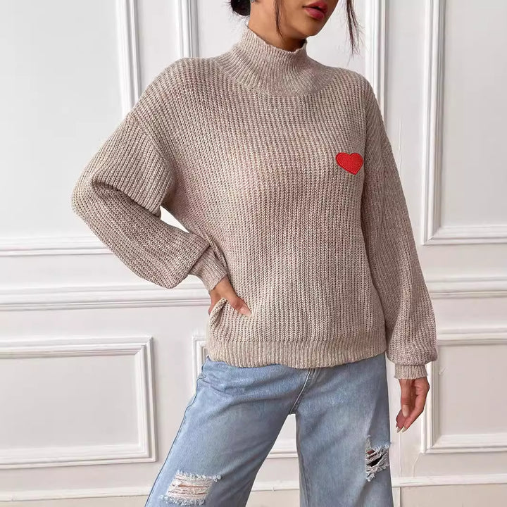 Dame rullekrave sweater med hjerteapplikation og løs pasform Stilla