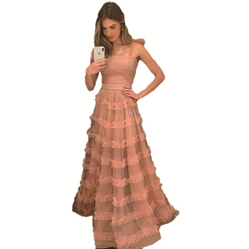 Dame maxikjole med voluminøse flæseskaber og strapless design Stilla