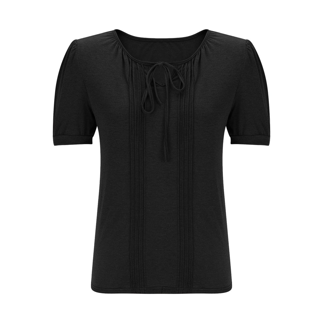 Damebluse med puffærmer og raffineret halterneck Stilla