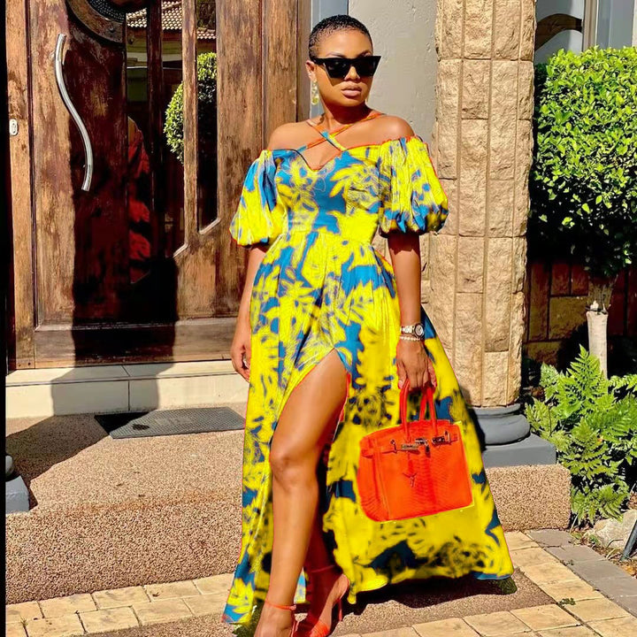 Dame maxikjole med off-shoulder snit og blomsterdetaljer Stilla