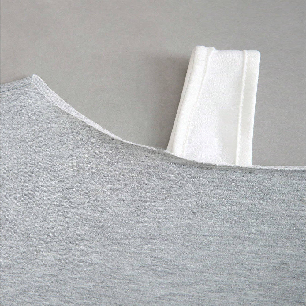 Kvindernes cropped sweatshirt med asymmetrisk design og voluminøse ærmer Stilla