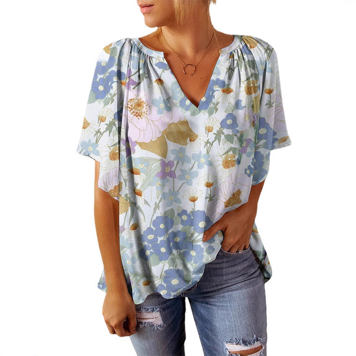 Damebluse med blomstermønster og V-hals Stilla