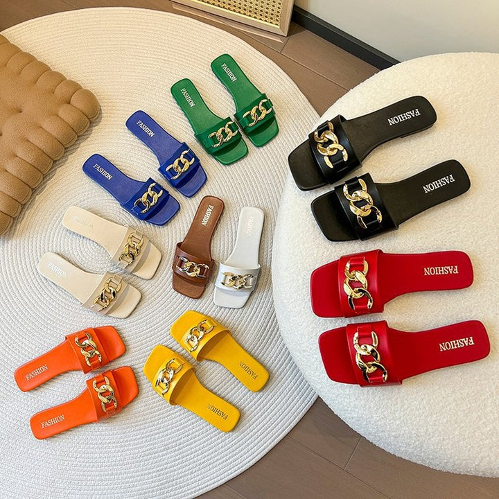 Dame slide-sandaler med elegant kædeudsmykning og behagelig fodseng Stilla