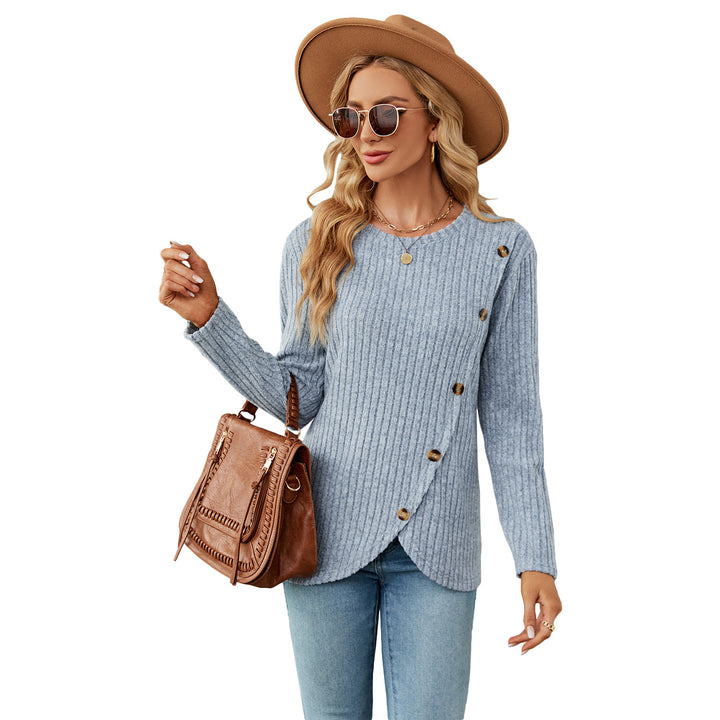 Dame strikpullover med asymmetrisk knapdesign og ribstruktur Stilla