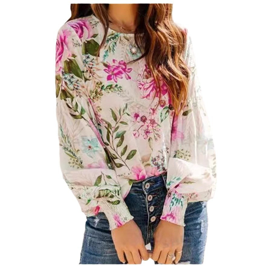 Damebluse med blomsterprint og voluminøse ærmer Stilla