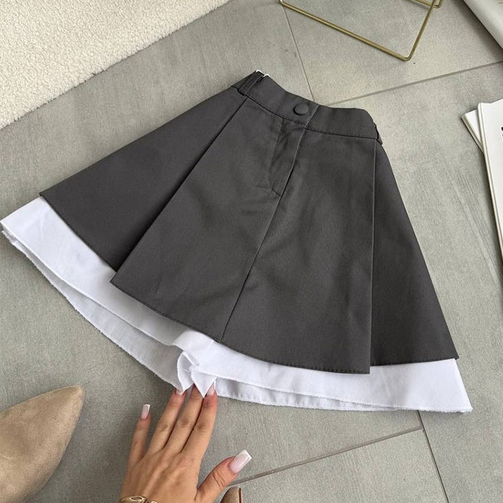 Dame udvidet miniskirt med knapdetalje og sidelommer Stilla