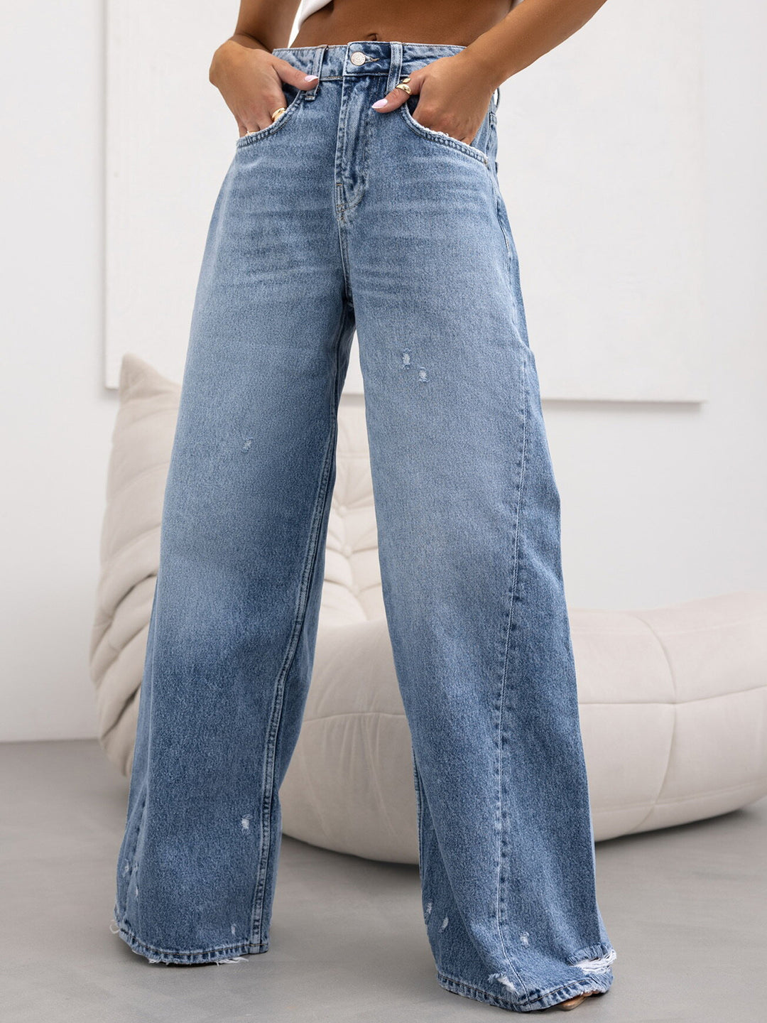 Dame bredde jeans i vintage-stil med høje lommer og trendy brugte effekter Stilla