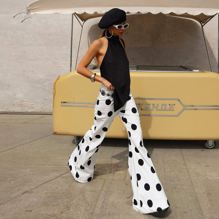 Dame Fashionable flared pants with stylish polka dot design Skovae