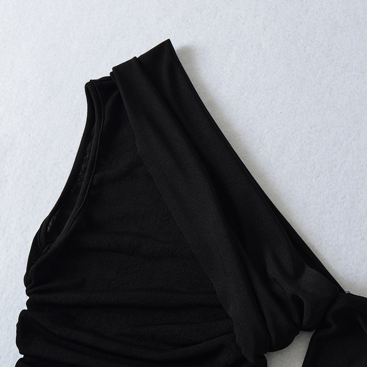 Dame asymmetrisk flæse top med elegant drapering detaljer Stilla