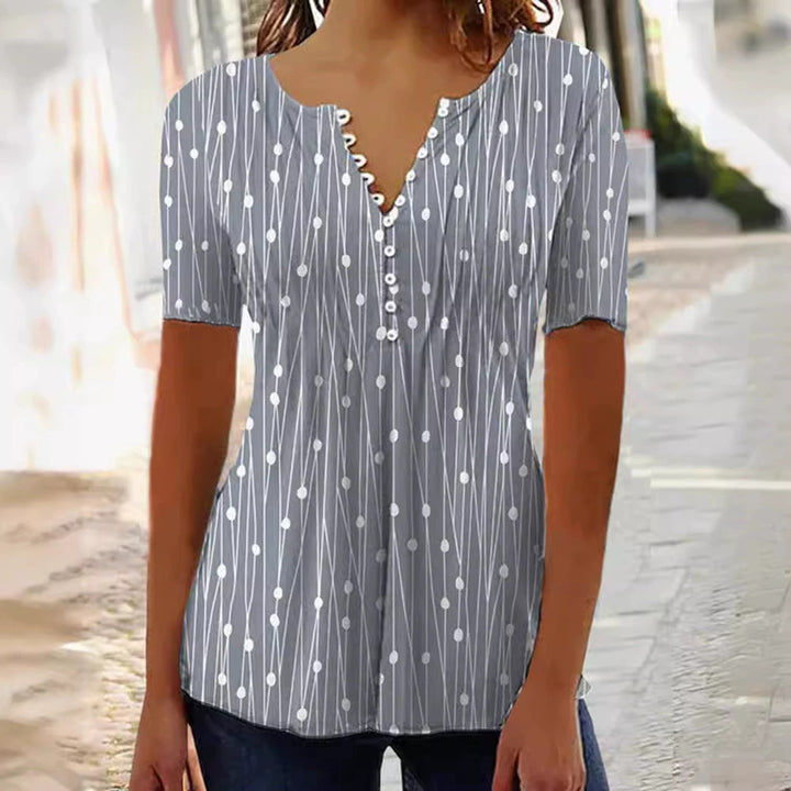 Dame bluse skjorte med moderigtigt prikkedesign og elegant knapliste Stilla