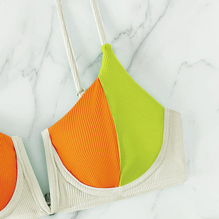 Dame trekantsbikini med moderne farveblokdesign og justerbare stropper Skovae