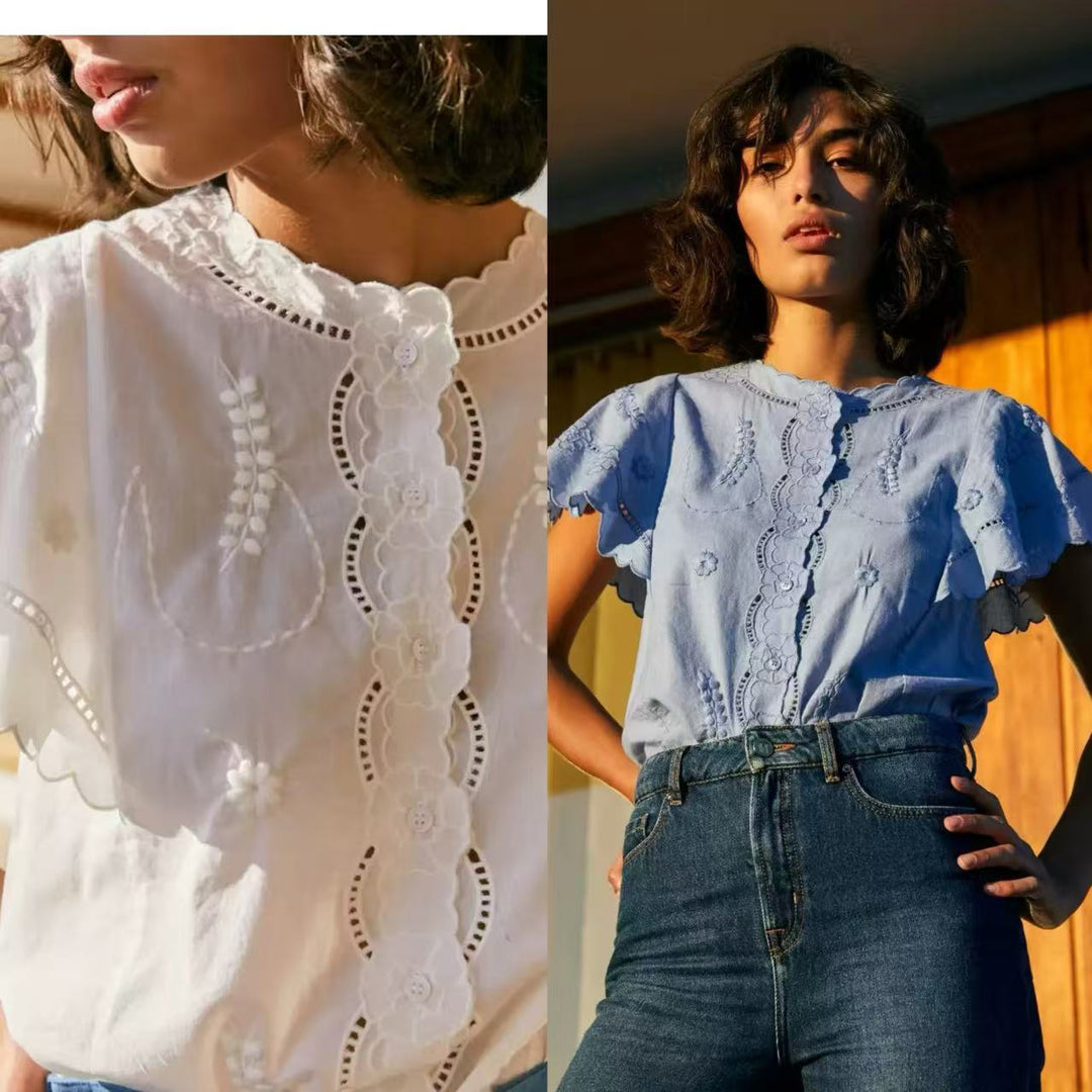 Dame bluse med elegante spidse accenter og voluminøse ærmer Stilla