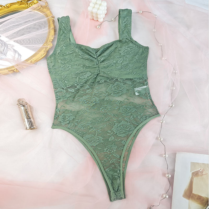 Dame spids-bodysuit med floral design og konturerende snit Stilla